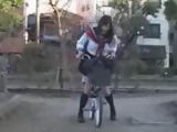 Crazy Girl Ridding A Bicycle With Vibrator On The Seat Through The City