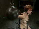 Hung redhead babe rides sybian and gets clamped