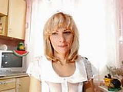 Mom is naughty in the kitchen at the camera. Free XXX | xvideosearch.com