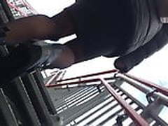 University girl in very tight black leather miniskirt HD | xvideosearch.com