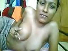 A dusky sexy chick playing woth herself in hostel on webcam