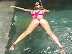 Violet Benson floating in thong bikini HD | xvideosearch.com