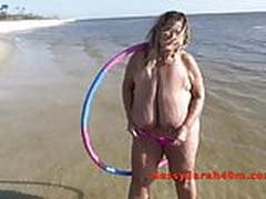 The biggest hanging saggy tits at the beach HD | xvideosearch.com