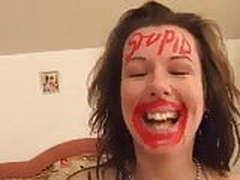 Slut gets stupid written on her forehead and likes it HD | xvideosearch.com