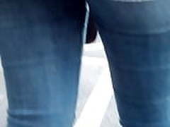 Young sexy girl in blue tight jean waiting at a bus stop 1 Online | xvideosearch.com