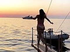 Alessandra Ambrosio jumping into the water at sunset Free XXX | xvideosearch.com