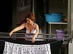 MILF neighbor showing downblouse on the balcony Online | xvideosearch.com