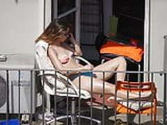Girl sunbathing on the balcony Free XXX | xvideosearch.com